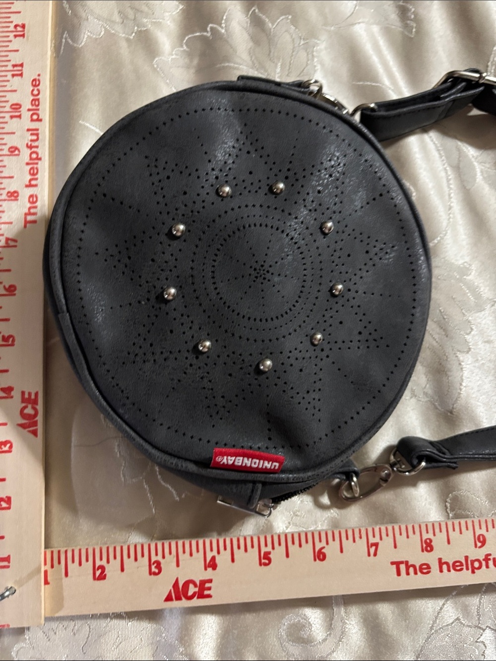 UNIONBAY Black Round Perforated Crossbody Bag with Stud Accents